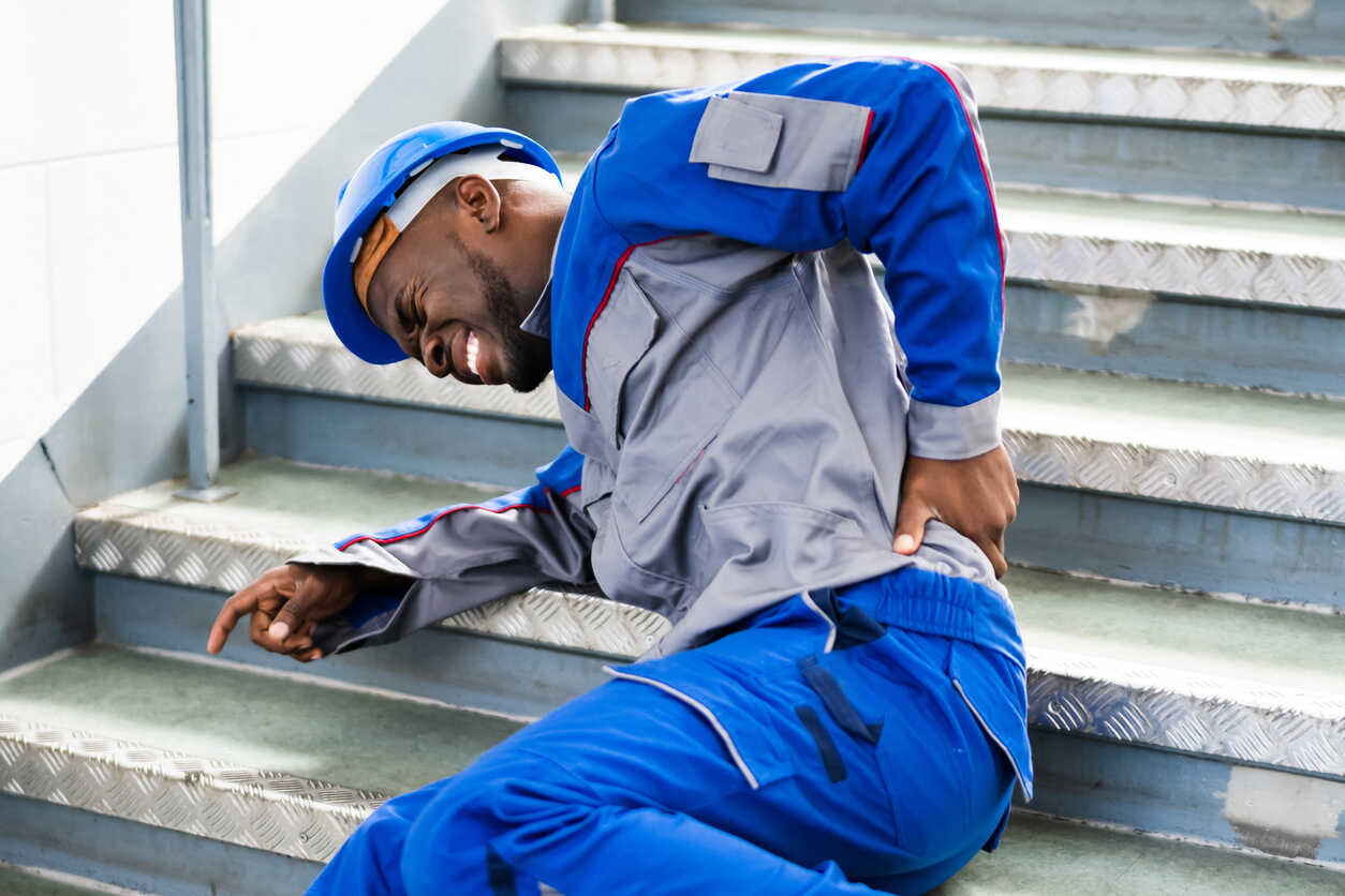 Man Lying On Staircase due to injury 