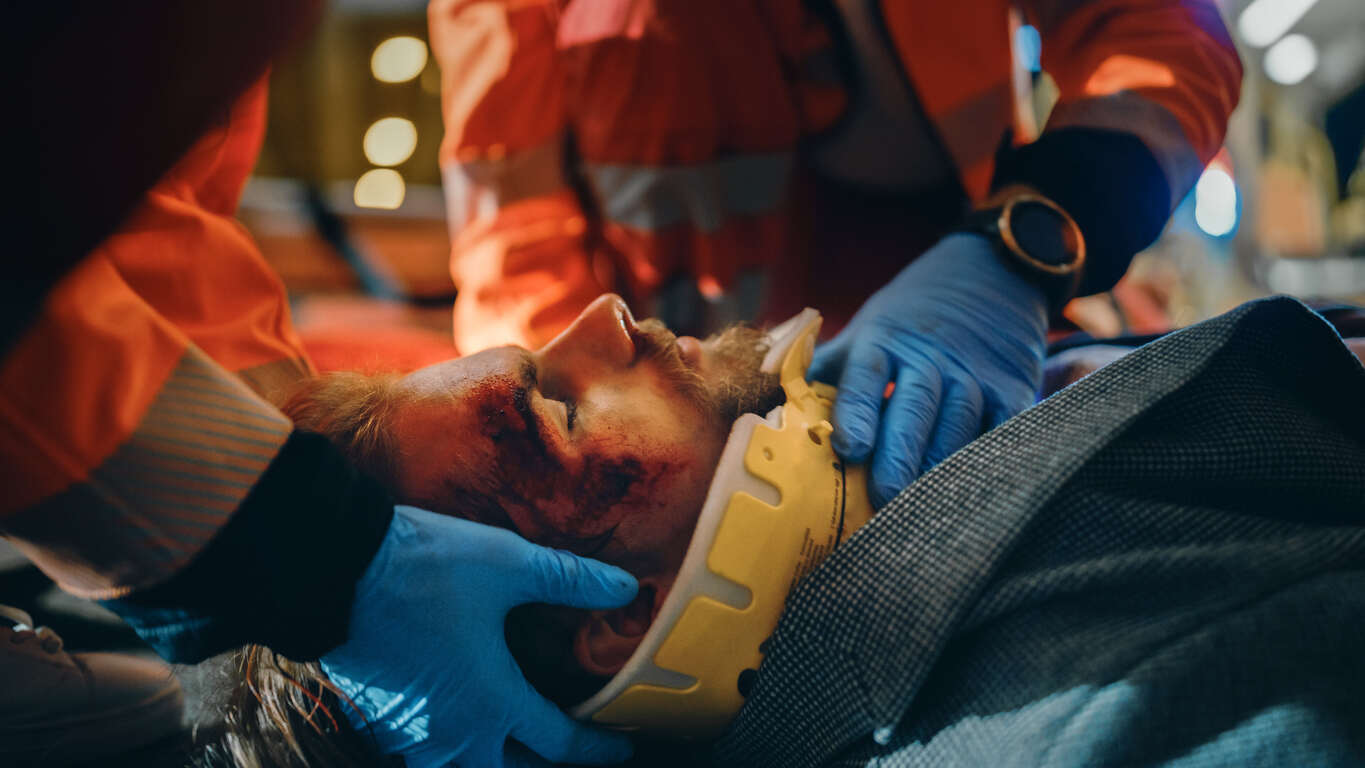 Injured man laying down