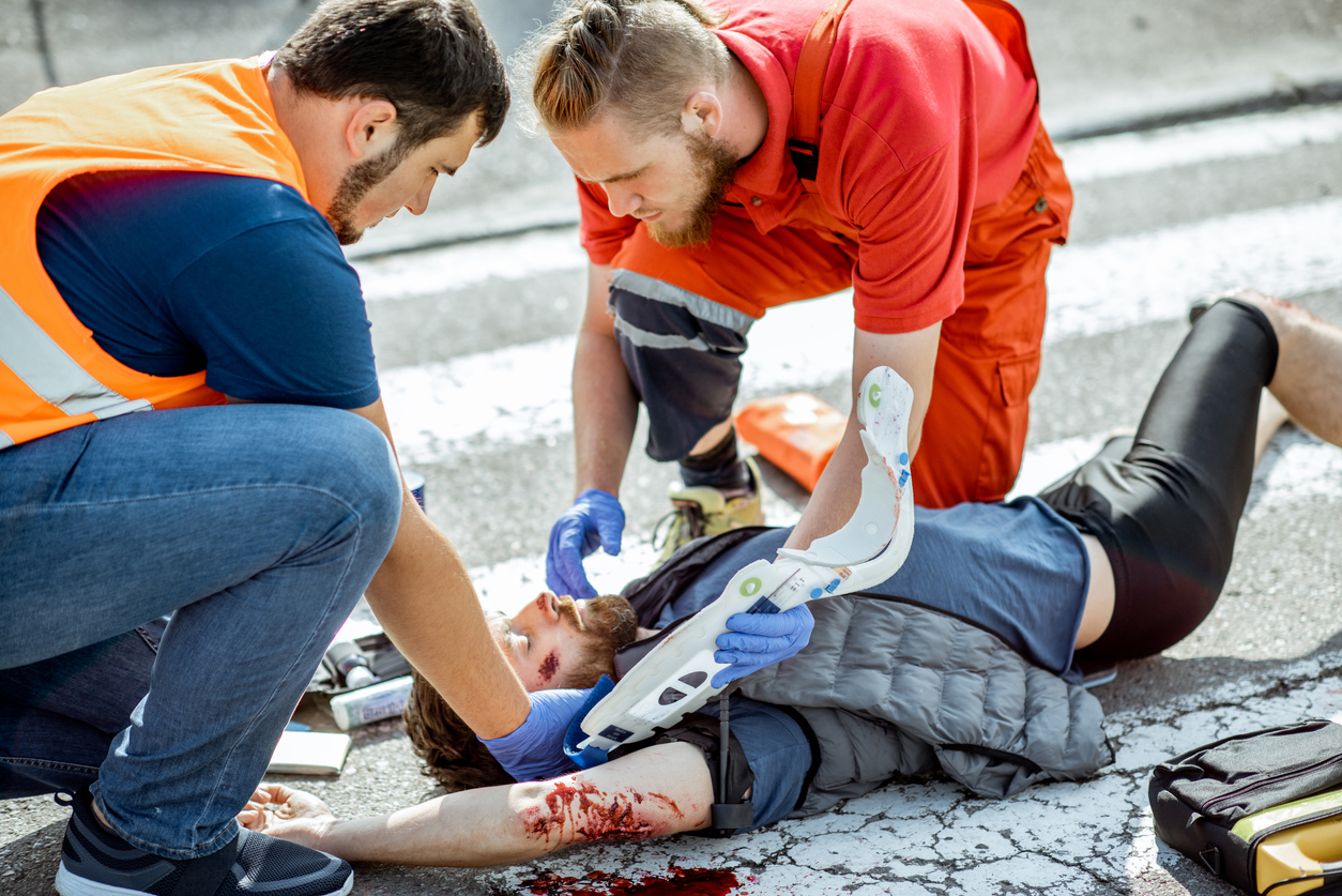 emergency care to the injured man